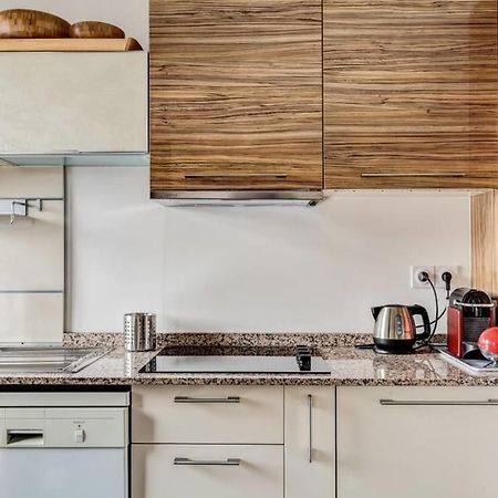 Appartement Des Toits - Welkeys Parigi Esterno foto