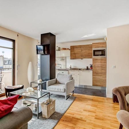 Appartement Des Toits - Welkeys Parigi Esterno foto