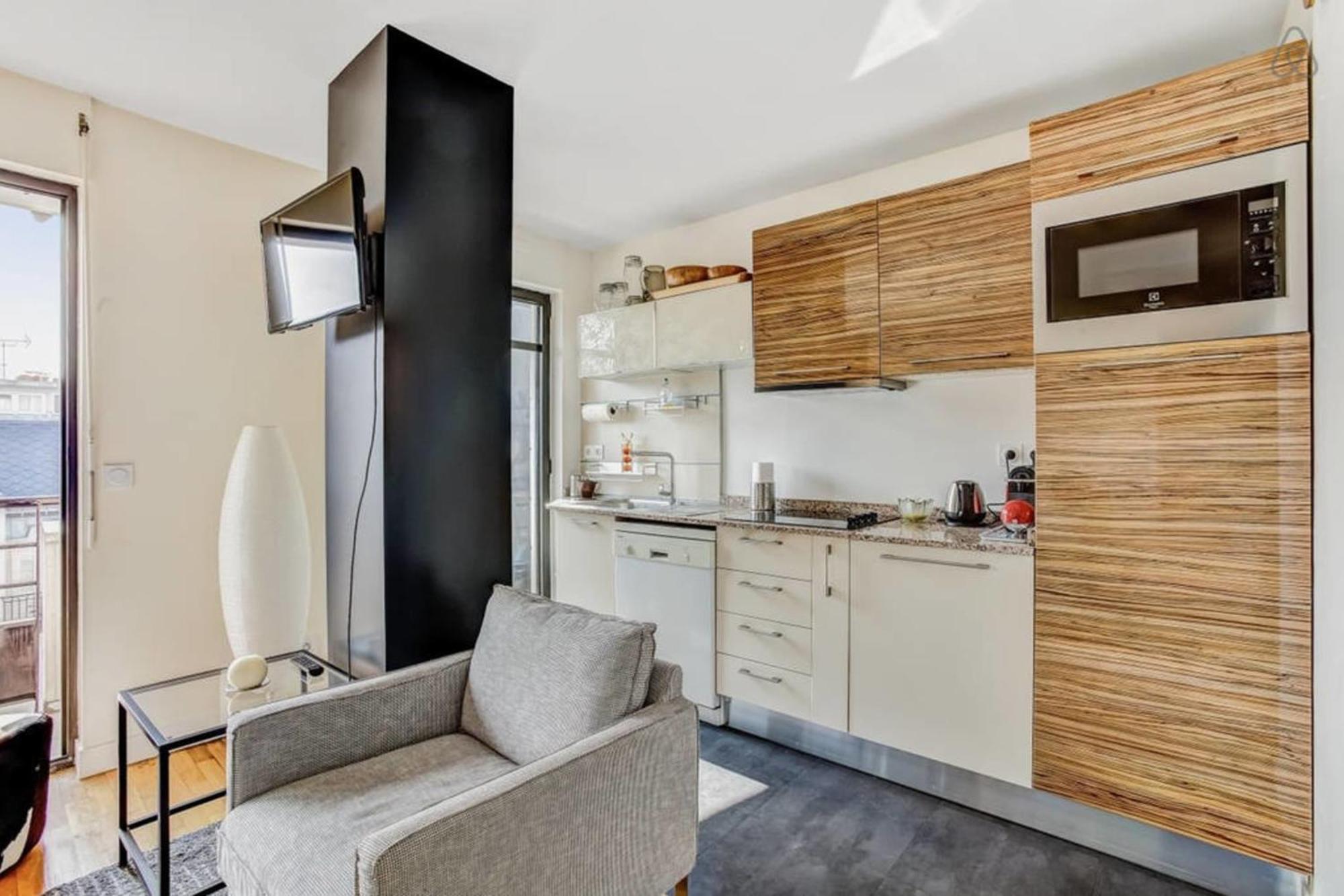 Appartement Des Toits - Welkeys Parigi Esterno foto